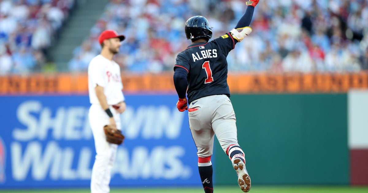 Braves and Phillies Split Doubleheader as Sale Reaches Milestone