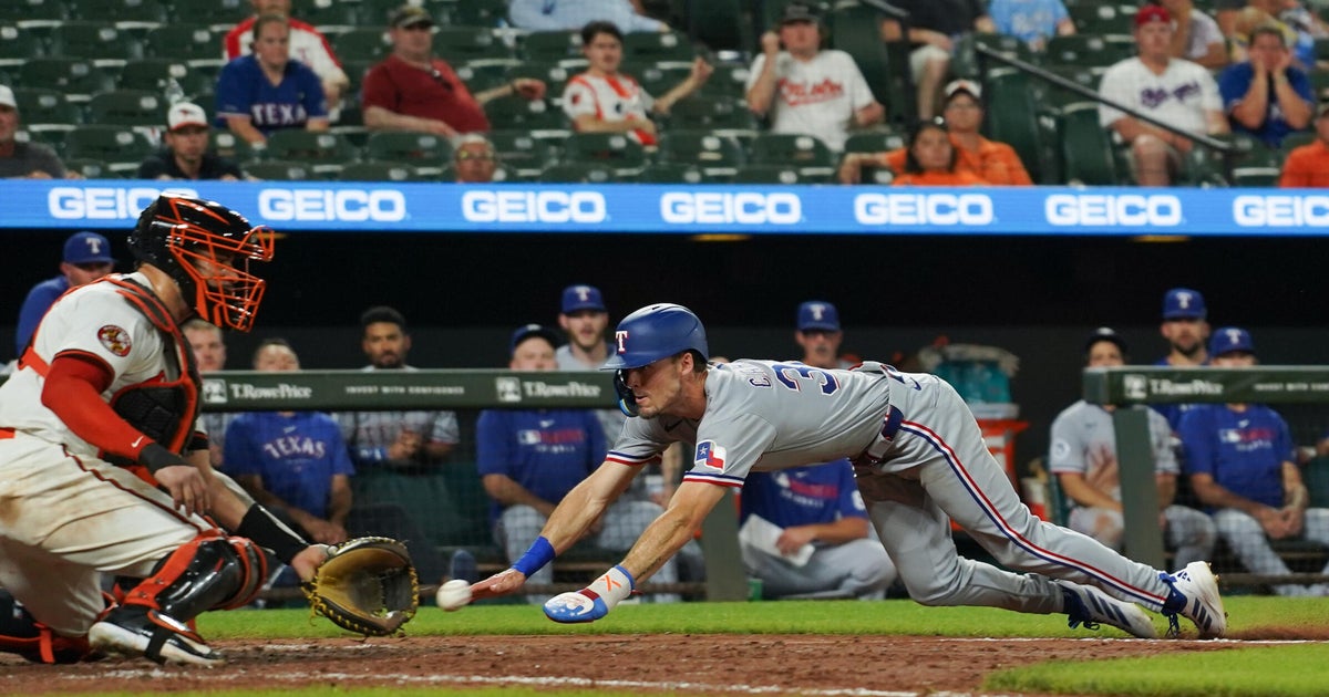 Evan Carter's Game-Winning Slide Secures Rangers' Victory Over Orioles